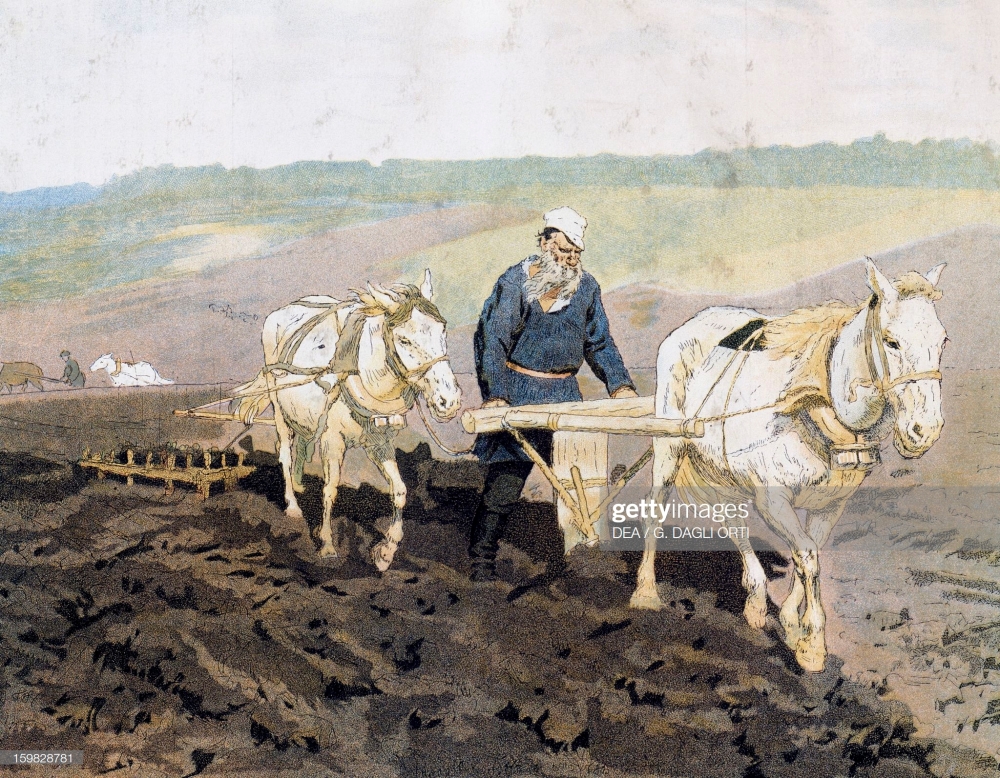 Tolstoy working in the field